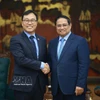政府总理范明政会见韩国驻越南大使崔泳三。图自越通社