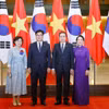 越南国会主席陈青敏夫妇与韩国国会议长禹元植夫妇合影。图自越通社