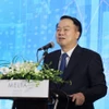 越南财政部副部长阮德芝发表讲话。图自财政部