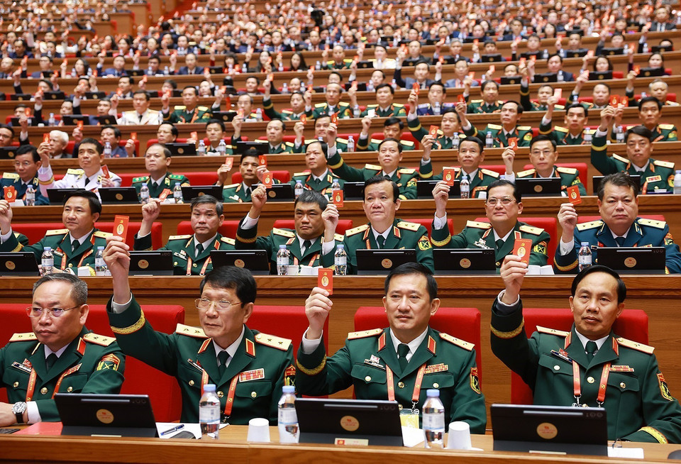 大会表决通过越南共产党第十四届中央委员会委员人数。图自越通社