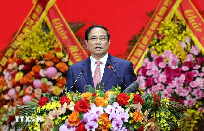 政府总理范明政在会上发言。图自越通社 2.jpg
