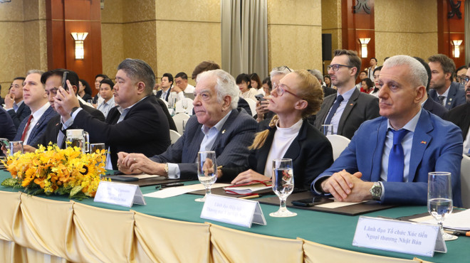 参会的企业代表。图自越通社 vna-potal-hoi-nghi-gap-go-giua-lanh-dao-tp-ho-chi-minh-va-cong-dong-doanh-nghiep-co-von-dau-tu-nuoc-ngoai-nam-2025-8374875.jpg