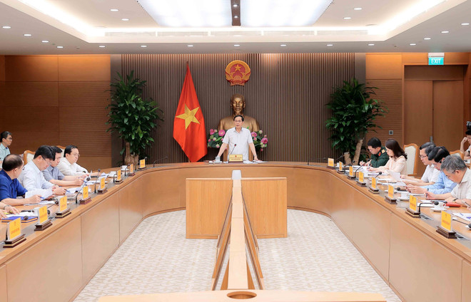 裴青山主持会议。图自越通社 vna-potal-day-manh-trien-khai-cac-thoa-thuan-quoc-te-sau-cac-hoat-dong-doi-ngoai-cap-cao-8154839.jpg