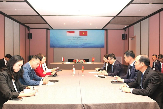 签字仪式场景。图自越通社 moc-1.jpg