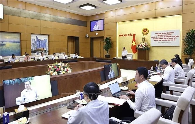 工作会议场景。图自越通社
