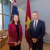 越南外交部副部长阮明姮和澳大利亚外交贸易部部长马特·西斯尔思韦特。图自越通社