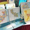 名为“神龙三十四片的”2026年桌面日历。图自越通社