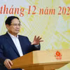 越南政府总理范明政发表讲话。图自越通社
