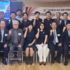 与会代表合影。图自越通社
