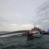 广宁省有关部门仍在全力开展下龙湾旅游船翻沉事故的搜救工作。图自越通社