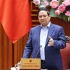 越南政府总理范明政发表讲话。图自越通社