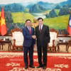 越共中央政治局委员、中央书记处常务书记陈锦秀会见老挝人民革命党中央总书记、国家主席通伦·西苏里。图自越通社