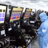 MCNEX VINA有限责任公司相机模块和电子元件的生产线。图自越通社
