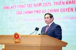 政府总理范明政在会议上致辞 图自越通社