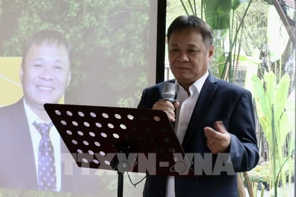 胡志明市建筑木材协会主席武光河。图自越通社