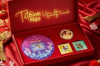 “丙午春节”邮票和“日马飞云”纪念币发行。图自越通社