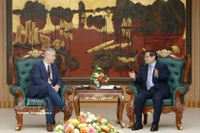 政府总理范明政会见比利时驻越南大使卡尔·范登博舍。图自越通社