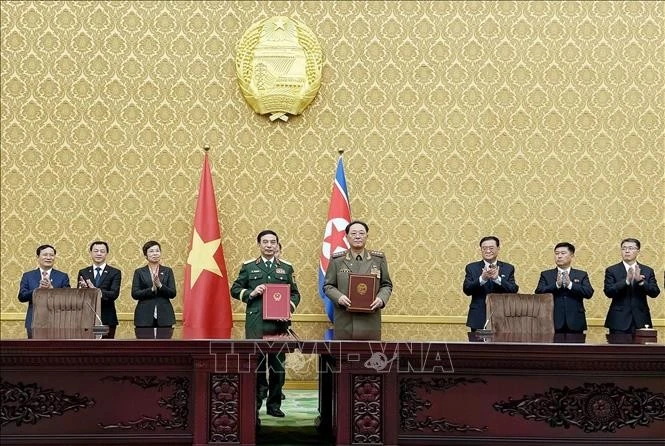 越南与朝鲜双边合作文件签署仪式在平壤举行。（图片来源：越通社）