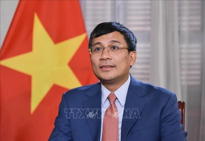 越南外交部常务副部长、越南UNESCO国家委员会主席阮明宇。（图片来源：越通社）