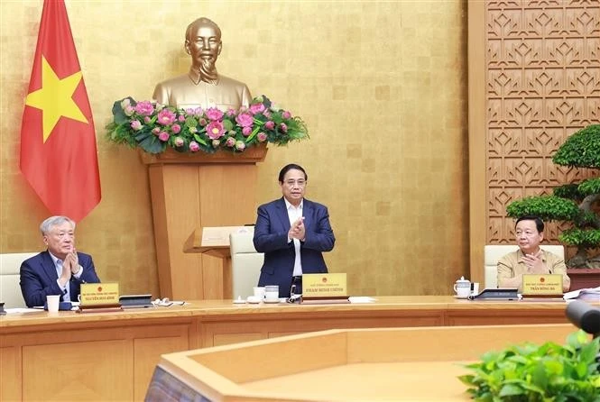 政府总理范明正在会上发表讲话。（图片来源：越通社）