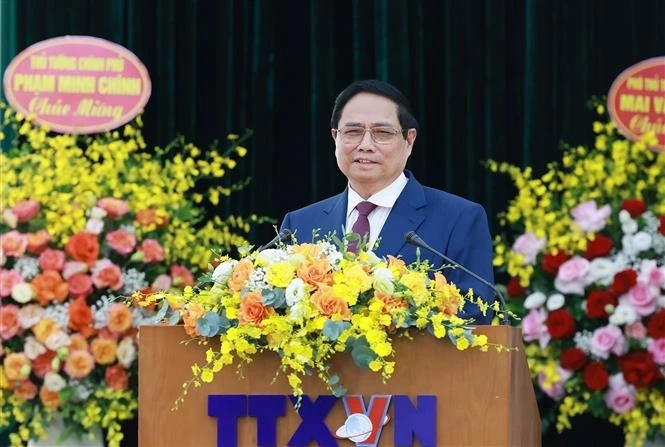 范明正总理在大会上发表讲话。（图片来源：越通社）