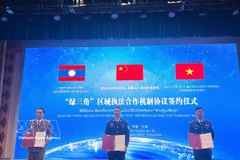 越中老三国代表签署绿三角区域执法合作机制协议。图自越通社