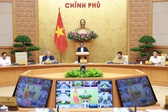 范明政总理主持召开政府与各地方全国视频会议。图自越通社