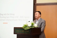 对外法务部主任武志勇发表讲话。图自越通社