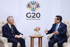 范明政总理会见加拿大总理马克·卡尼。图自越通社