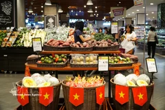 在马来西亚永旺超市入口处摆放越南商品。图自越通社