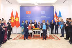 越共中央书记处常务书记陈锦秀出席越柬合作文件交换仪式。图自越通社