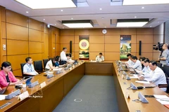 国会常委会召开的一场会议。图自越通社