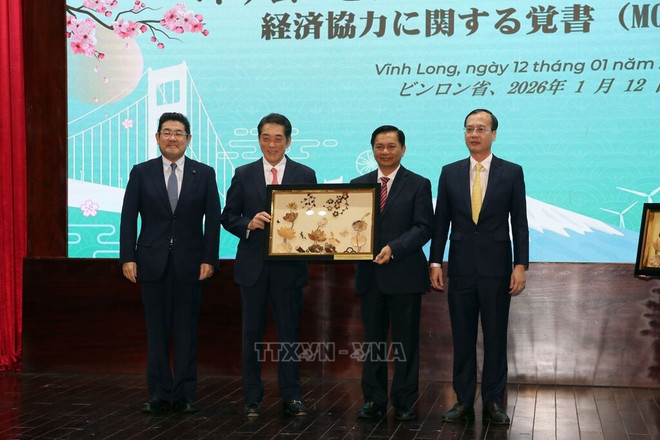 201542-tinh-vinh-long-ky-ket-ban-ghi-nho-hop-tac-voi-tinh-ehime-nhat-ban.jpg