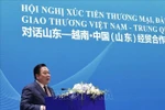 越共中央委员、中央政策与战略委员会副主任、越中友好协会主席阮黄英发表讲话。图自越通社