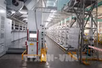 Unitex 染整纺织有限公司的纺纱厂采用新技术，按照自动化模式优化生产运营。图自越通社