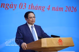 越南政府总理、国家国际融入指导委员会主任范明政发表讲话 图自越通社