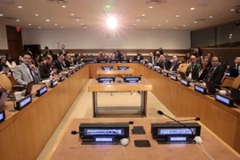 出席《河内公约》签约仪式推介活动的代表 图自越通社