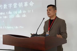 中国企业代表发表讲话 图自越通社