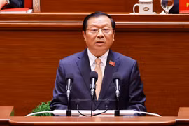 越共中央委员、党委书记、中央宣传与民运部常务副部长赖春门就新纪元中的政治思想工作问题作发言。图自越通社