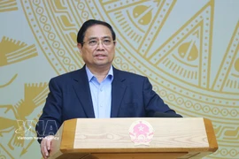 范明政总理发表讲话 图自越通社