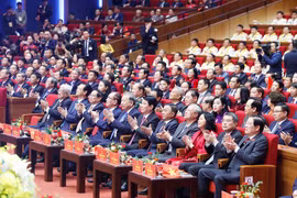 越南党和国家领导出席大会 图自越通社