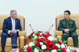 会见场景 图自越通社