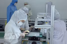 越南 Heesung Electronics 有限责任公司的笔记本电脑组装线 图自越通社