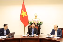 12月25日上午，政府副总理胡国勇主持与司法部的工作会议，听取2025年12月工作计划落实情况及下一阶段重点任务汇报。 图自越通社