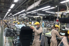 丰田纺织（河内）公司的生产活动 图自越通社