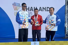阮文亨在男子50米蛙泳SB11级比赛中，以36秒37的成绩夺冠 图自越通社
