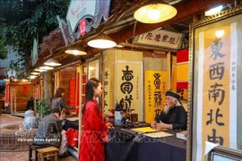 新春求字活动仍是书法节的核心亮点 图自越通社