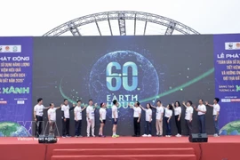 2026年3月21日，以“绿色创新，绿色未来”为主题的“全民高效节约利用能源暨响应2026年地球一小时活动”启动仪式在河内举行。图自越通社