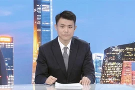 中国中央广播电视总台越南语部主任魏为 图自越通社