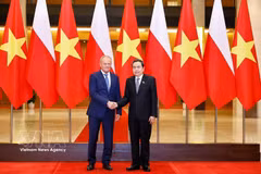 越南国会主席陈青敏和波兰总理唐纳德·图斯克。图自越通社